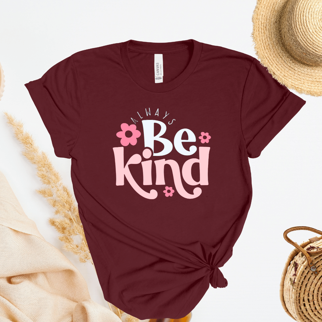 Maroon t-shirt with 'Always Be Kind' text on a light background