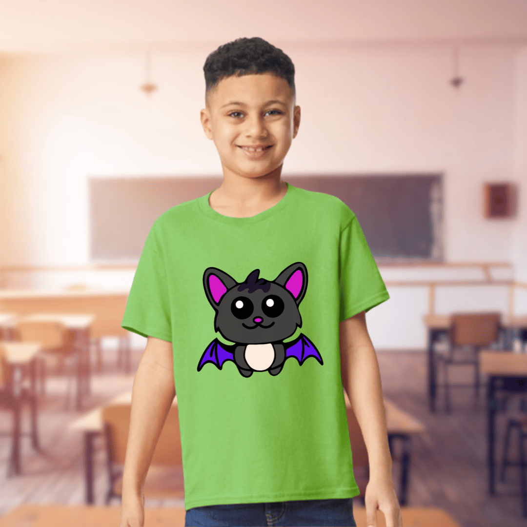 Child wearing a green t-shirt with a cartoon cat design in a classroom setting