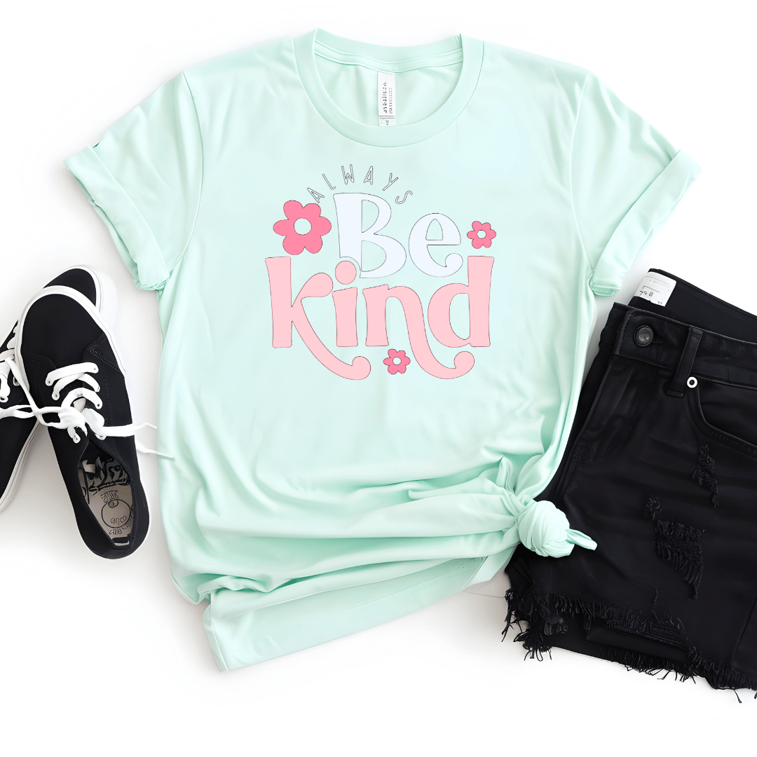 Mint green t-shirt with 'Always Be Kind' text on a white background