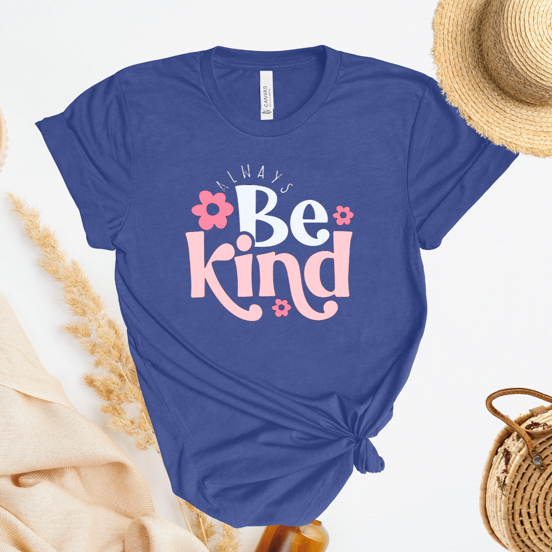 Purple t-shirt with 'Always Be Kind' text on a light background