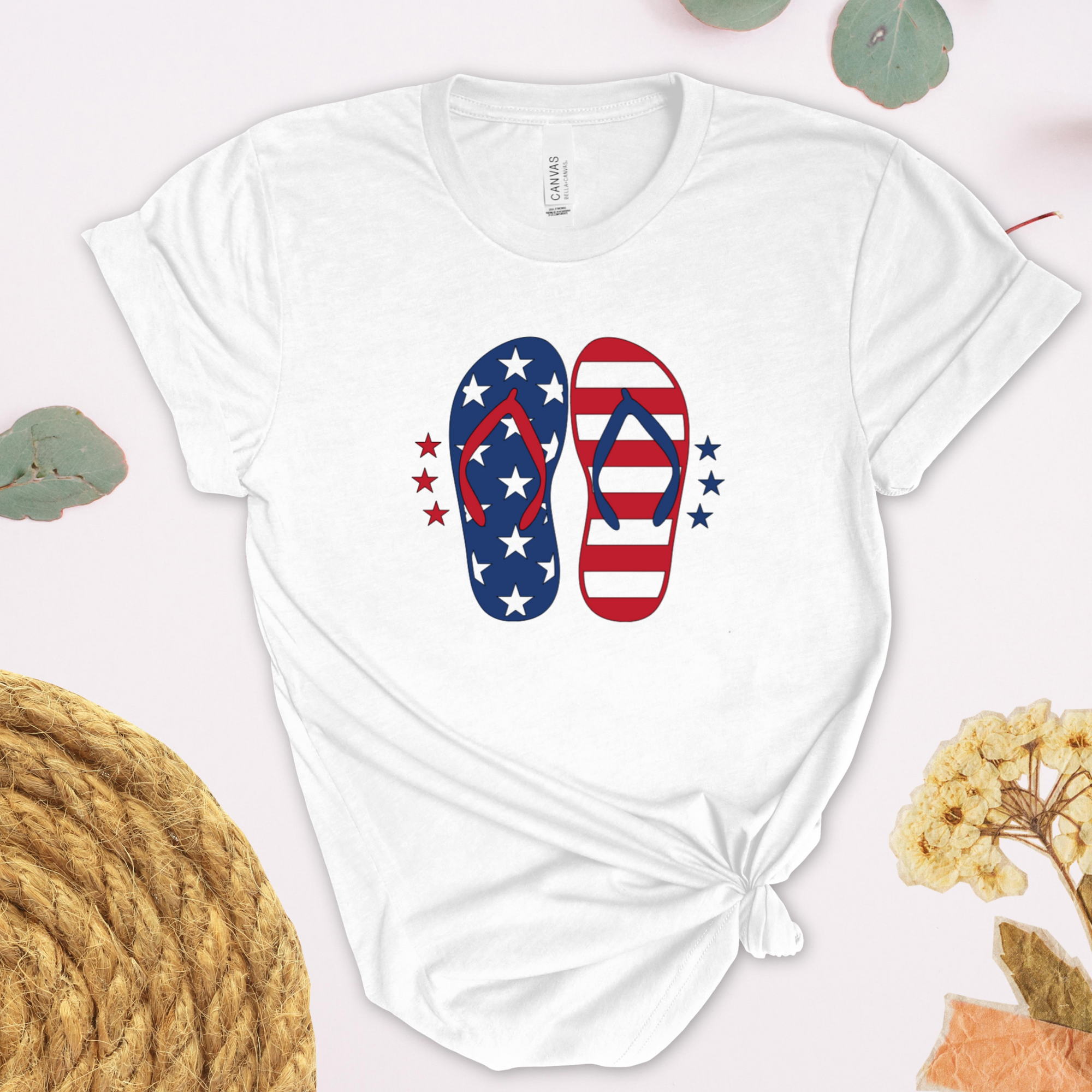 White t-shirt with American flag flip-flop design on a light background