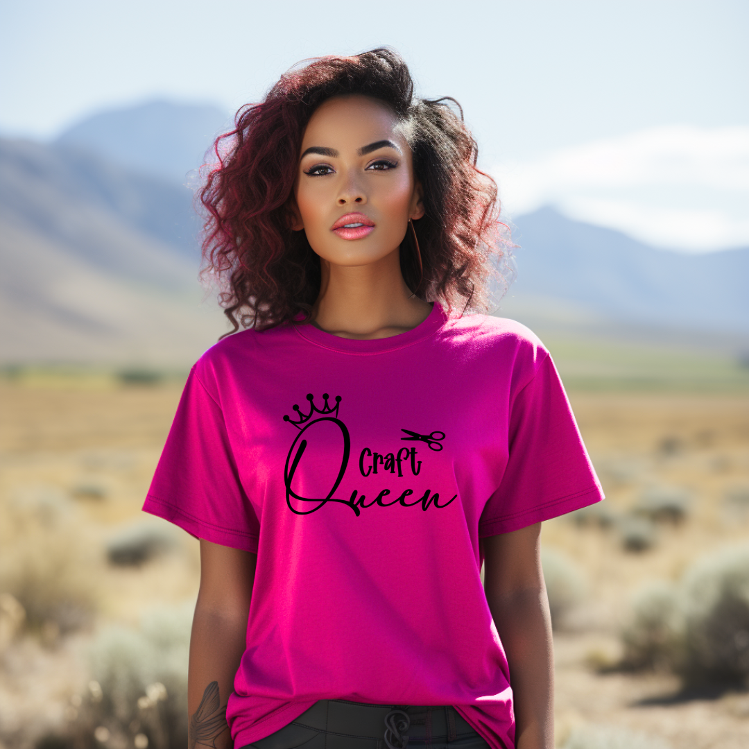 Woman wearing a pink 'Craft Queen' t-shirt in a desert landscape