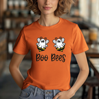 Person wearing an orange t-shirt with 'Boo Bees' design in a casual setting