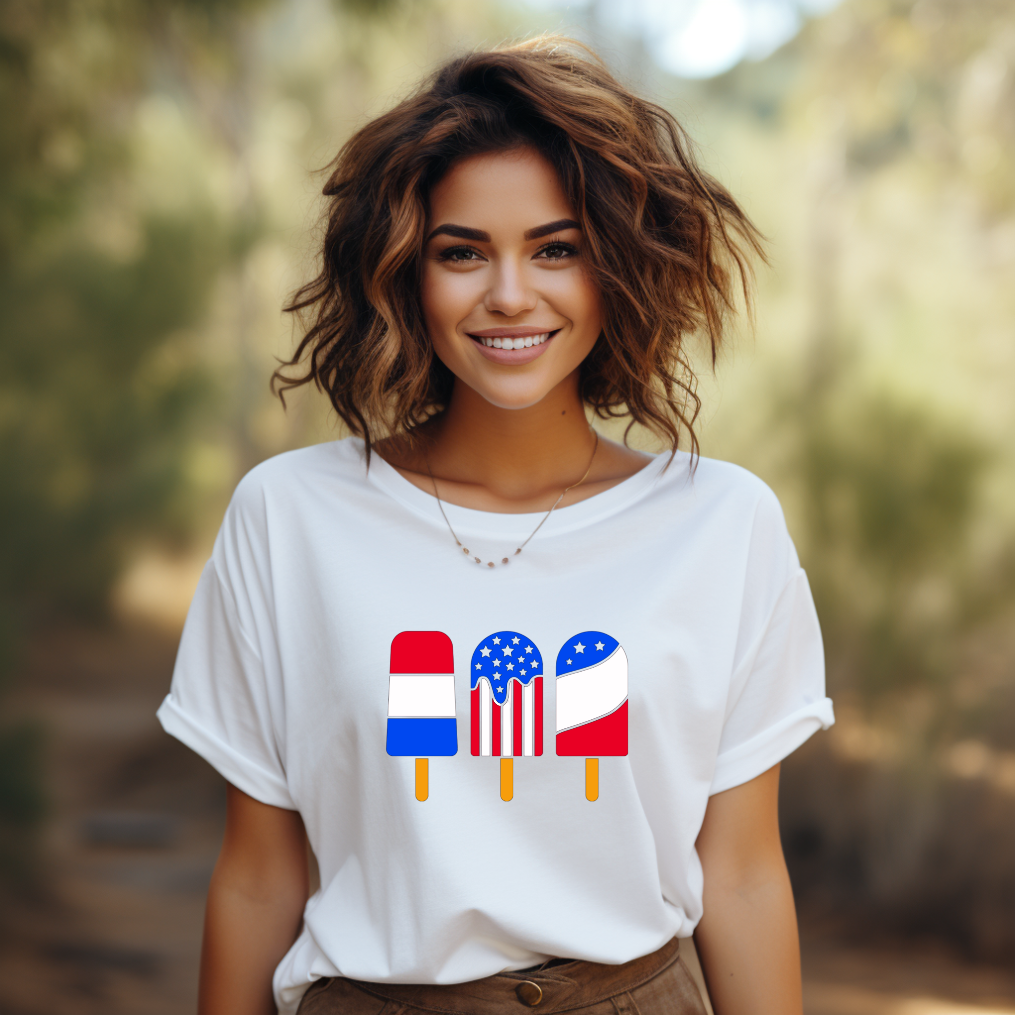 Woman wearing a white t-shirt with colorful popsicle design outdoors