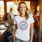 Woman wearing a white t-shirt with a graphic design in a casual setting