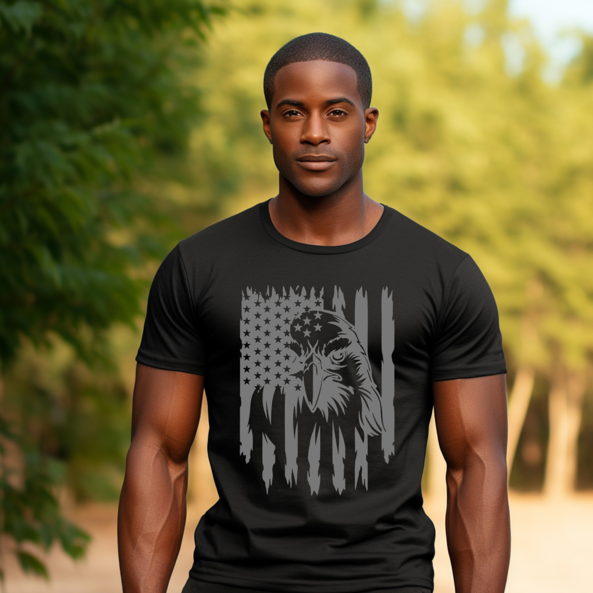 Man wearing a black t-shirt with an eagle and flag design outdoors