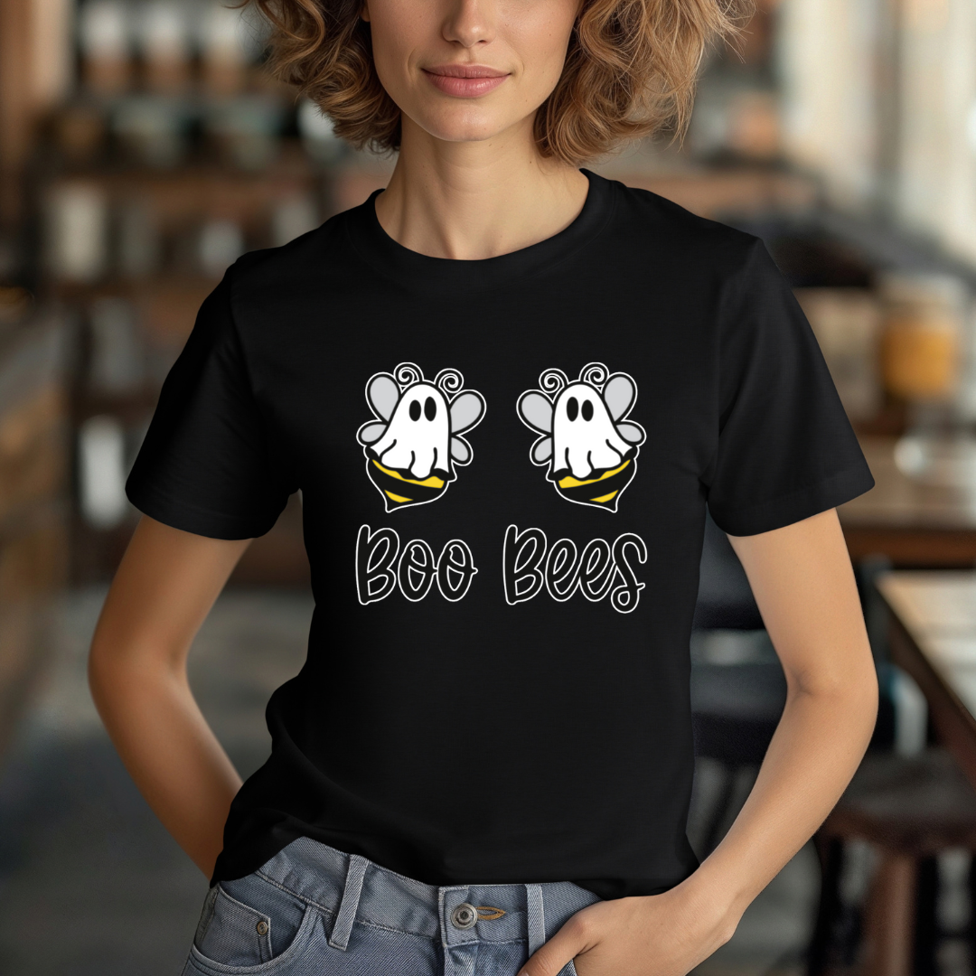 Person wearing a black t-shirt with 'Boo Bees' design in a casual setting