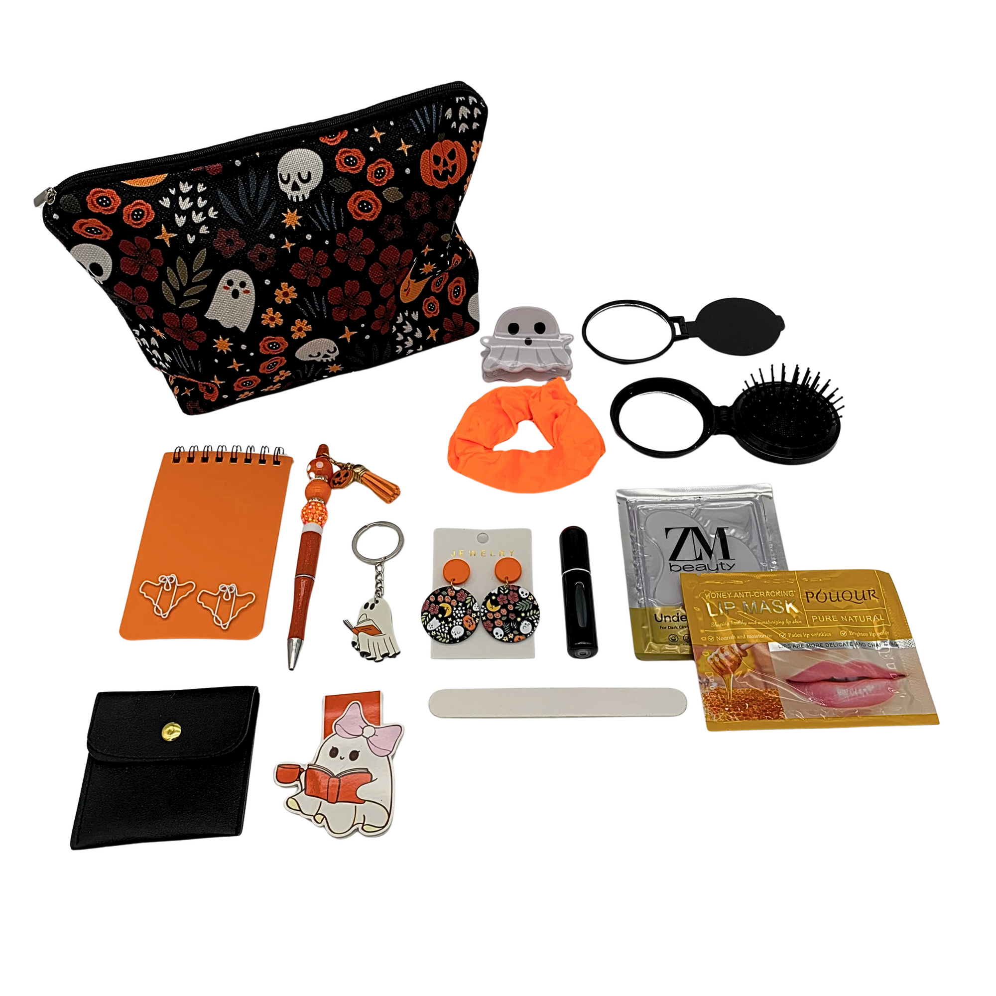Collection of small items including a pencil case, notebook, and various accessories on a white background
