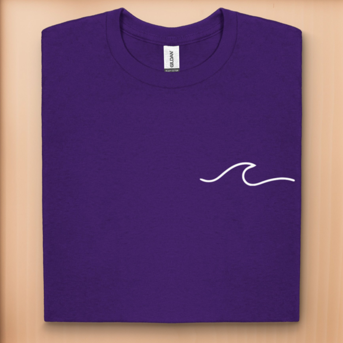 Minimalist t-shirt with white wave logo on the left
