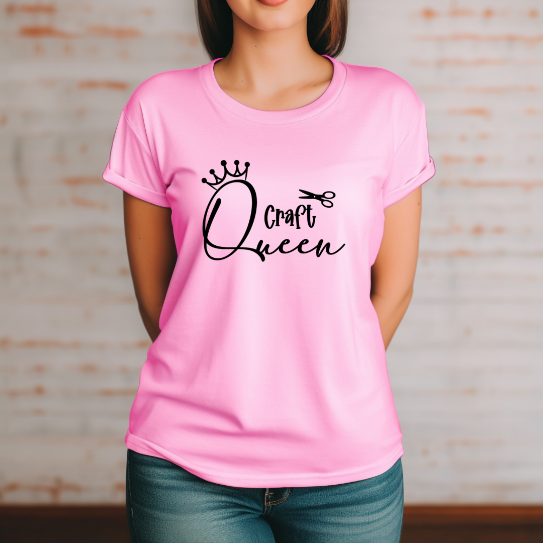 Person wearing a pink t-shirt with 'Craft Queen' text and crown graphic.