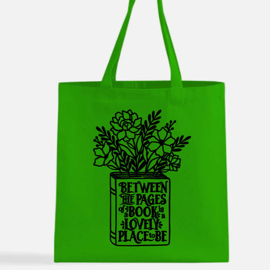 Green tote bag with black floral design and text on a white background