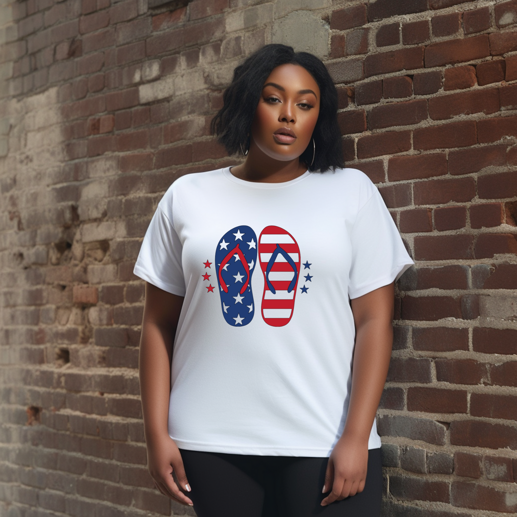 Person wearing a white t-shirt with American flag flip-flop design against a brick wall.