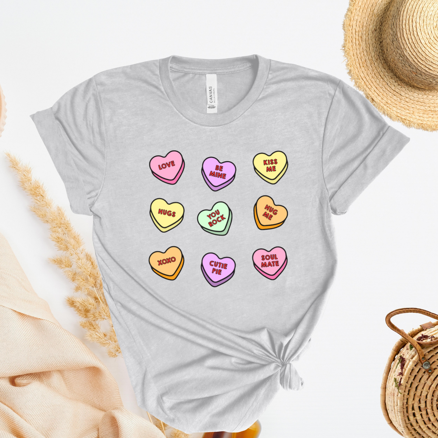 Shirt with conversation heart candies with phrases like "LOVE" and "BE MINE"