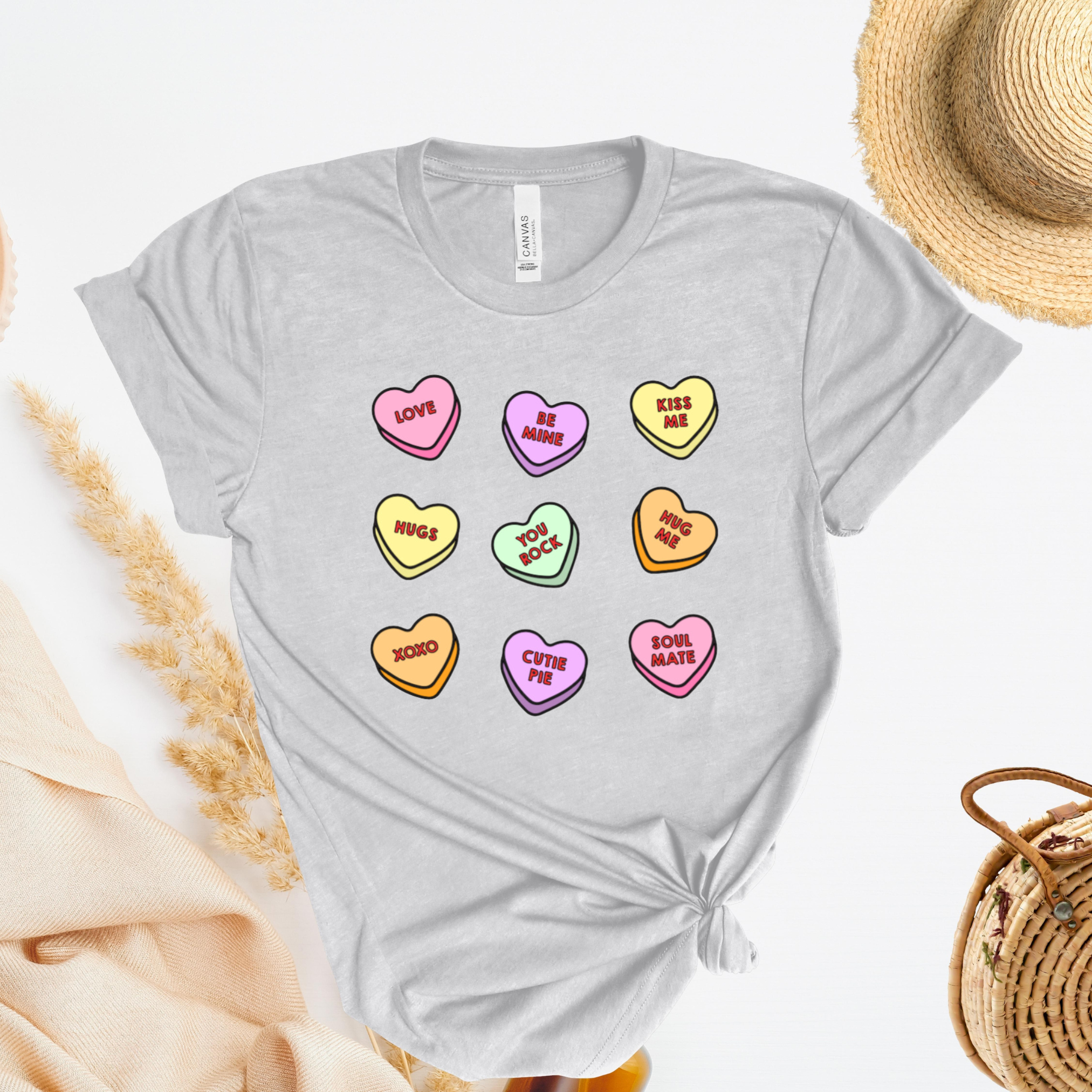 Shirt with conversation heart candies with phrases like "LOVE" and "BE MINE"