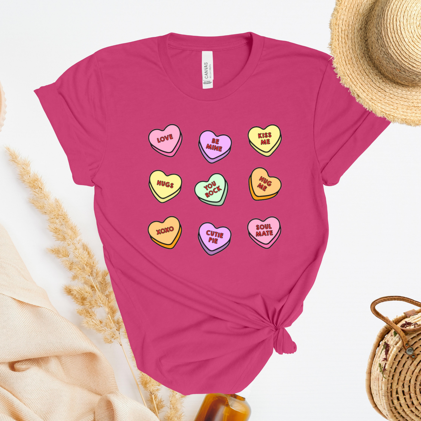 Shirt with conversation heart candies with phrases like "LOVE" and "BE MINE"