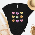 Shirt with conversation heart candies with phrases like "LOVE" and "BE MINE"