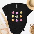 Shirt with conversation heart candies with phrases like "LOVE" and "BE MINE"