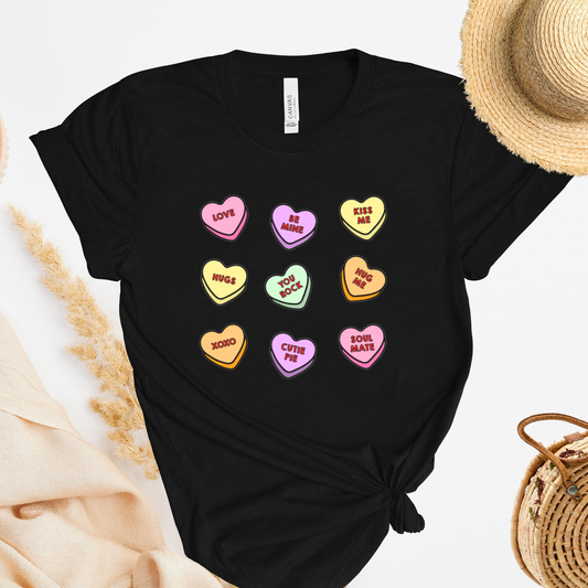 Shirt with conversation heart candies with phrases like "LOVE" and "BE MINE"