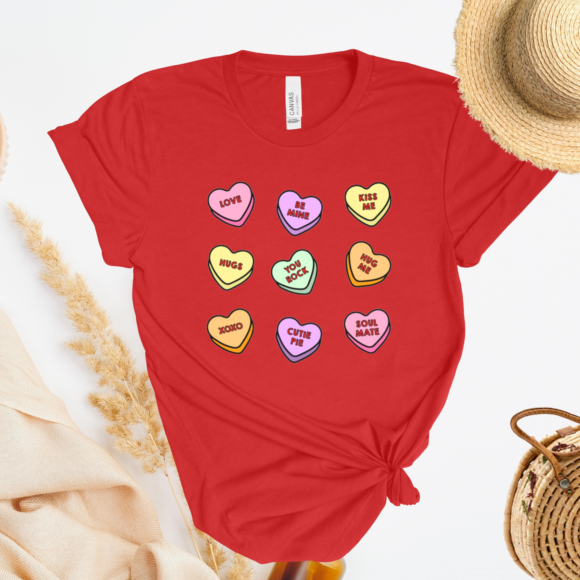Shirt with conversation heart candies with phrases like "LOVE" and "BE MINE"