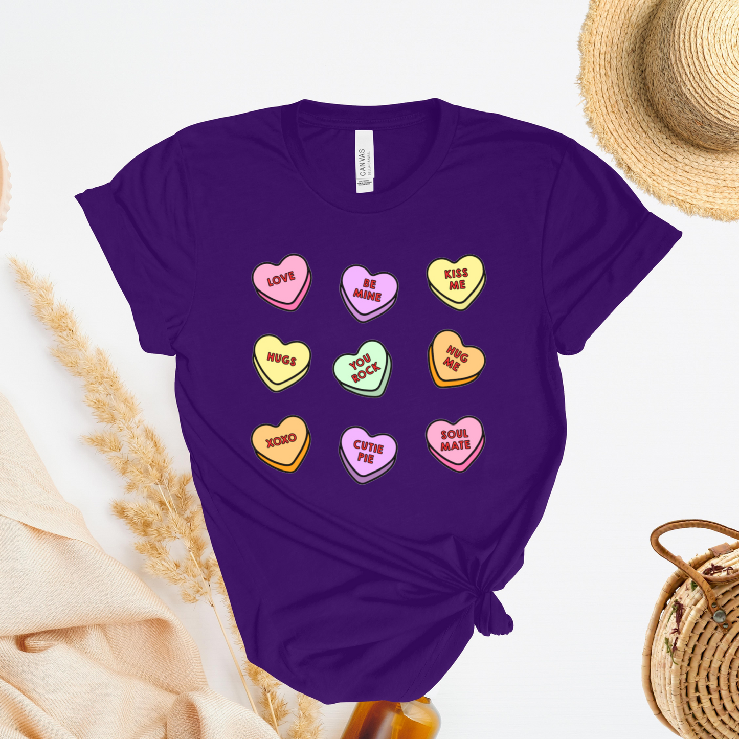 Shirt with conversation heart candies with phrases like "LOVE" and "BE MINE"