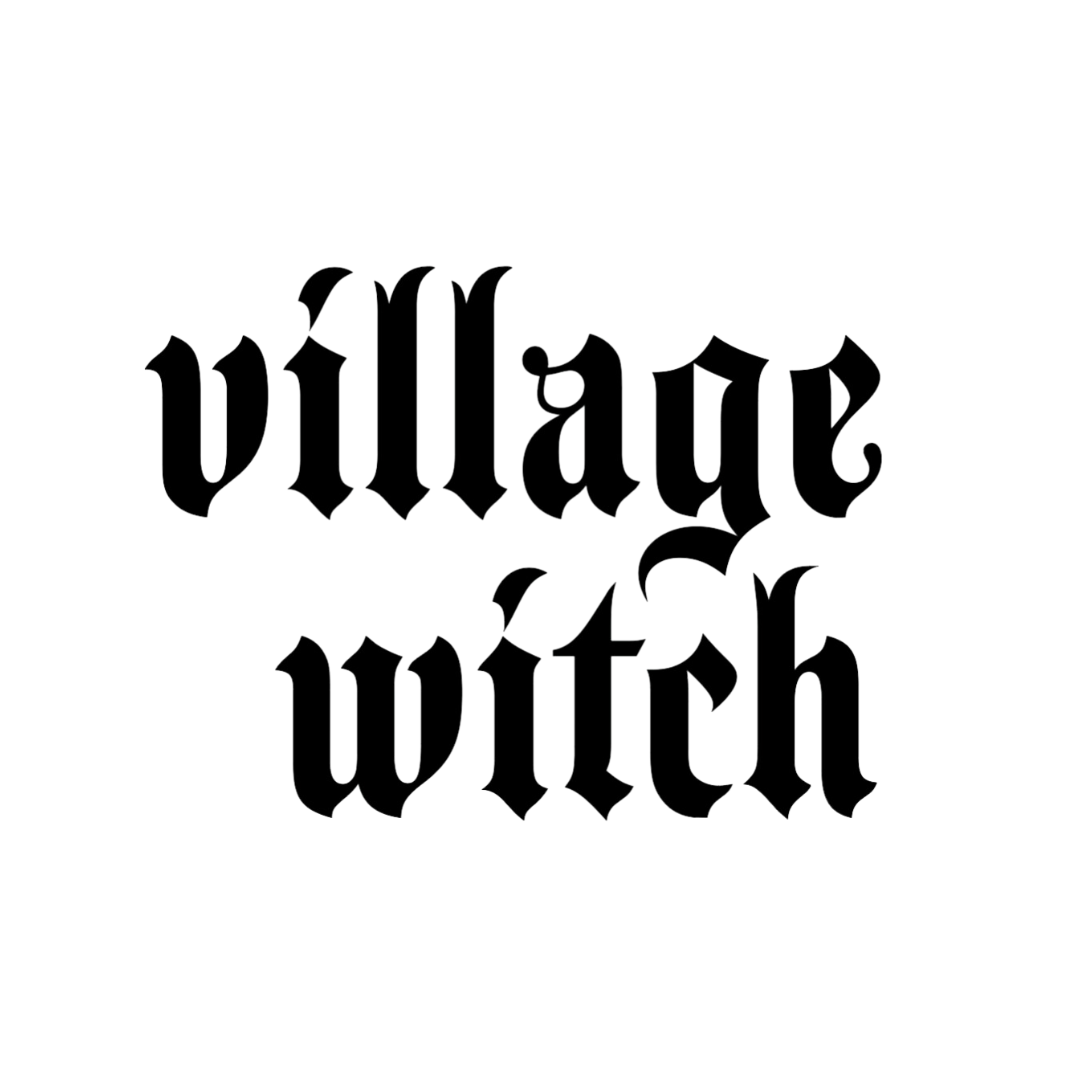 Black text 'village witch' on a white background