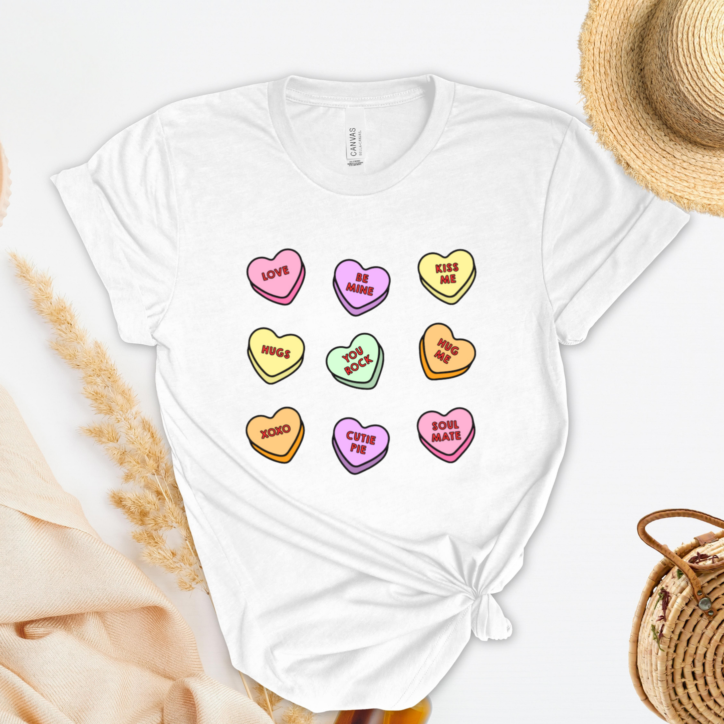 Shirt with conversation heart candies with phrases like "LOVE" and "BE MINE"