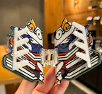 Open hair clip featuring a cat holding a stack of books