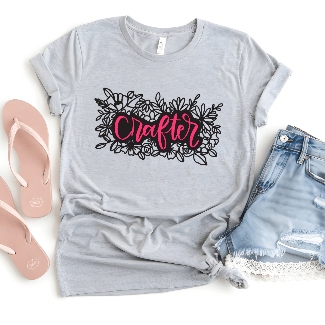 Crafter floral t-shirt in light gray with pink hand-lettered script and black floral illustratio