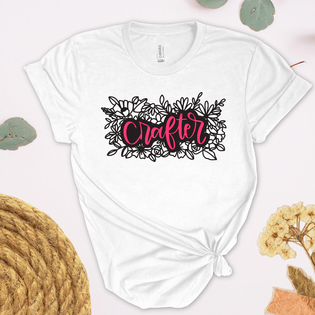 Crafter floral t-shirt in white with pink hand-lettered script and black floral illustration