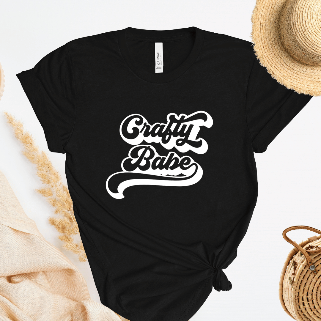 Black t-shirt with 'Crafty Babe' text on a light background