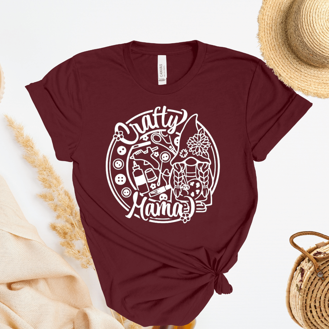 Maroon t-shirt with 'Crafty Mama' graphic design on a light background