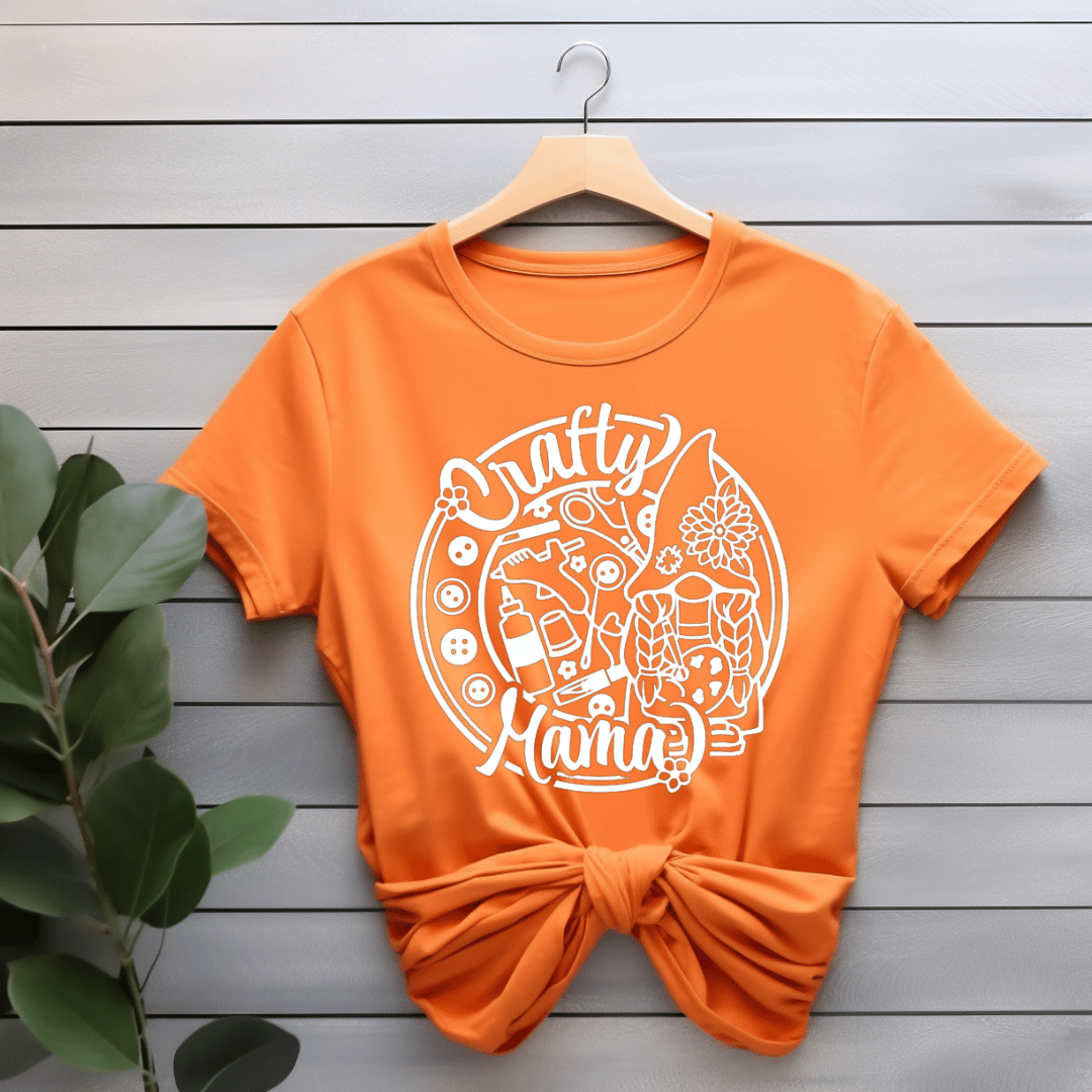 Orange t-shirt with 'Crafty Mama' design on a white background