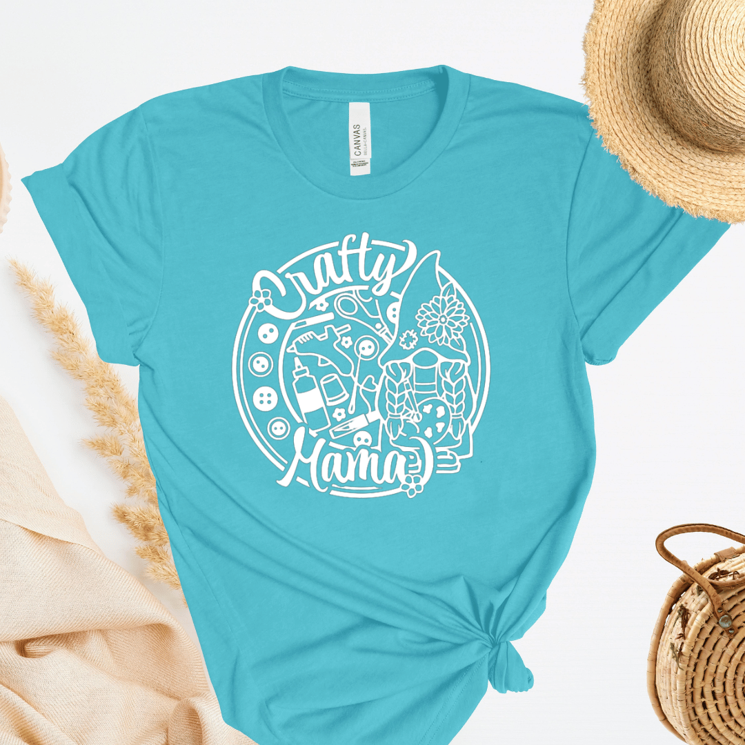 Turquoise t-shirt with 'Crafty Mama' design on a white background