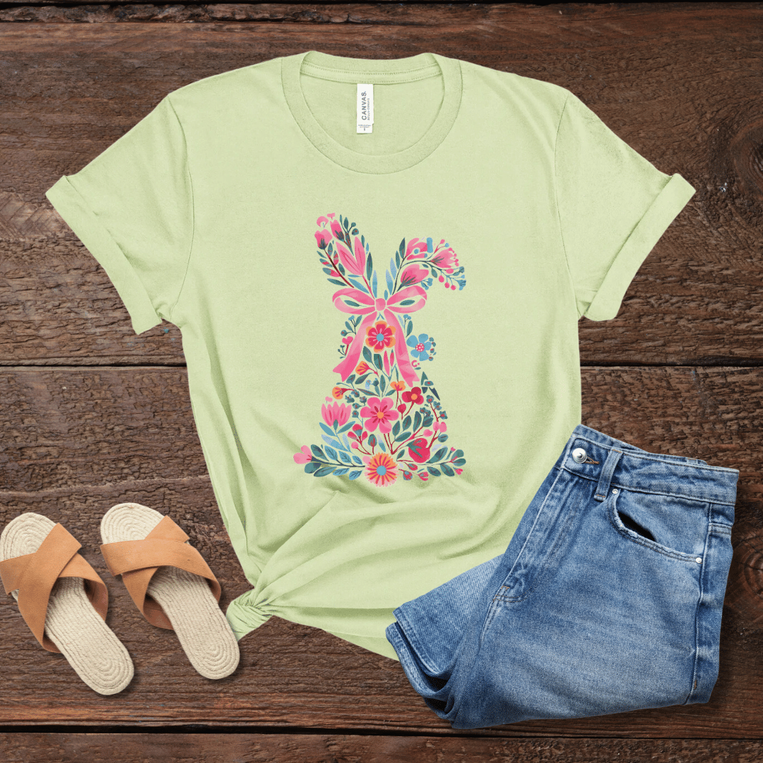 Floral Easter bunny t-shirt in spring green on dark wood with jeans & sandals