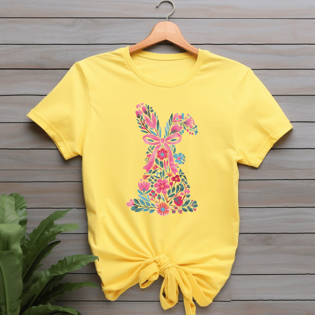 Floral Easter bunny t-shirt in yellow displayed on wooden hanger