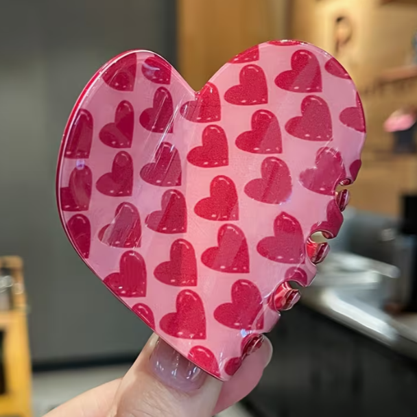 Back view of Valentine's Day heart-shaped claw clip with glossy pink finish