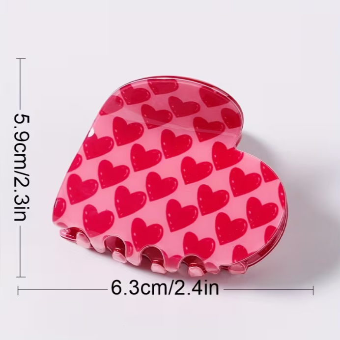 Heart claw clip measurements showing 2.3in height and 2.4in width medium size