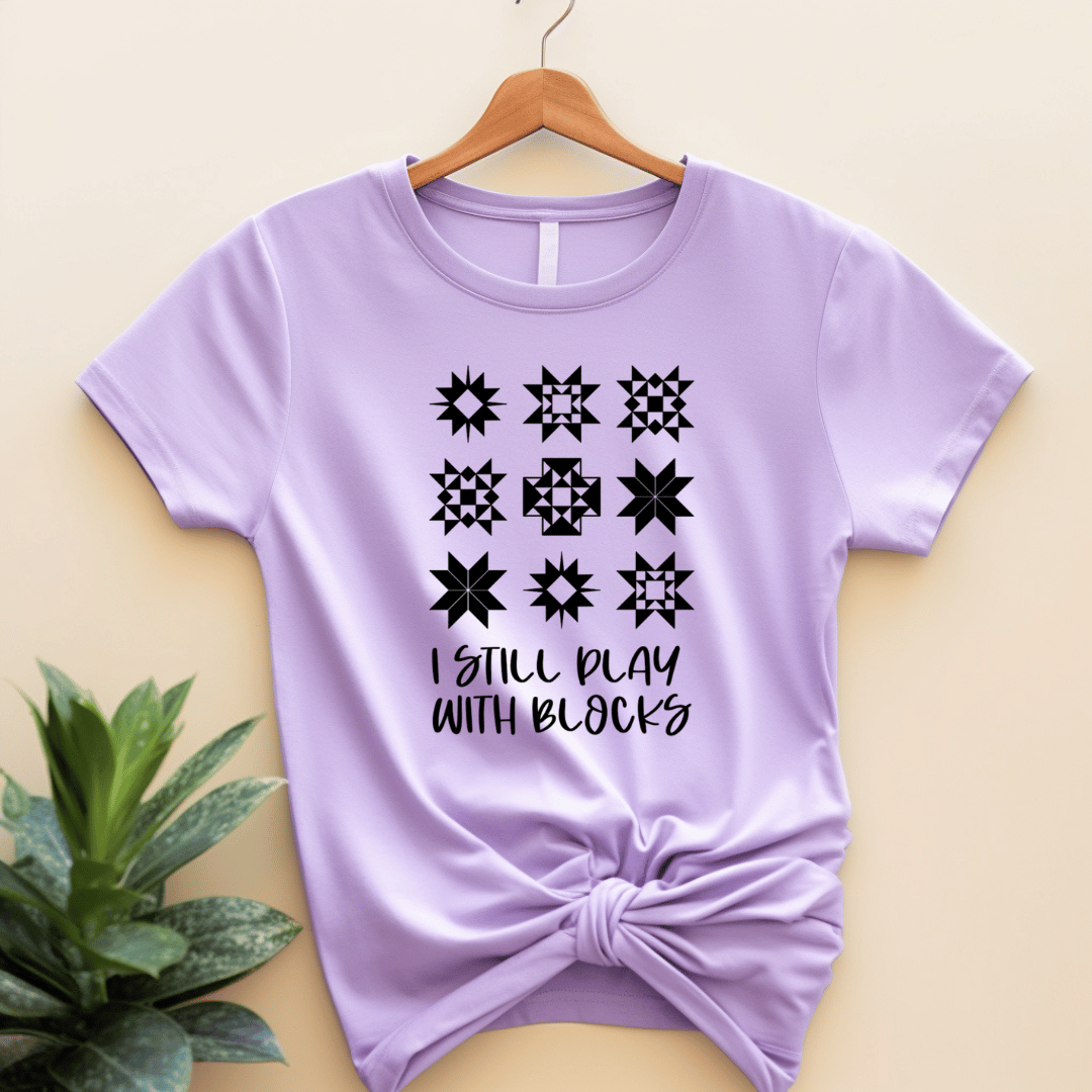 I Still Play With Blocks funny quilting t-shirt in purple lilac with quilt star block grid design