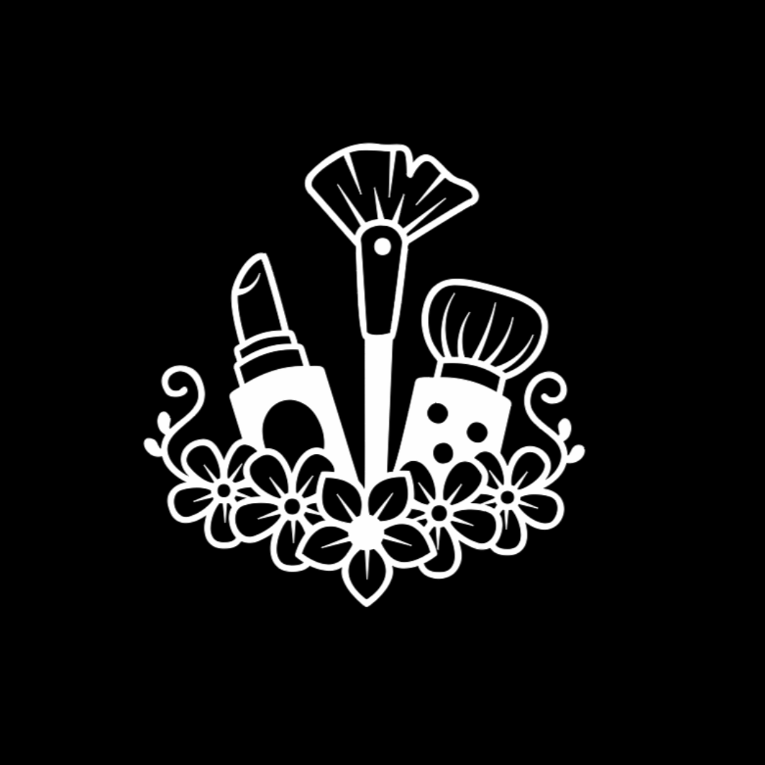 White makeup brushes, lipstick and delicate floral accents on black beauty apron