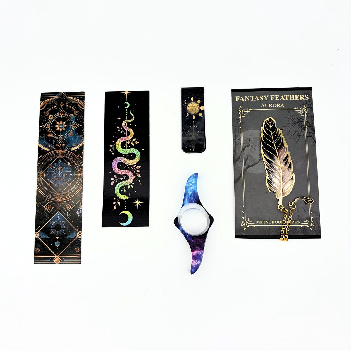 Four celestial bookmarks, a galaxy thumb page holder and a gold metal feather bookmark from the mystical witchy gift box