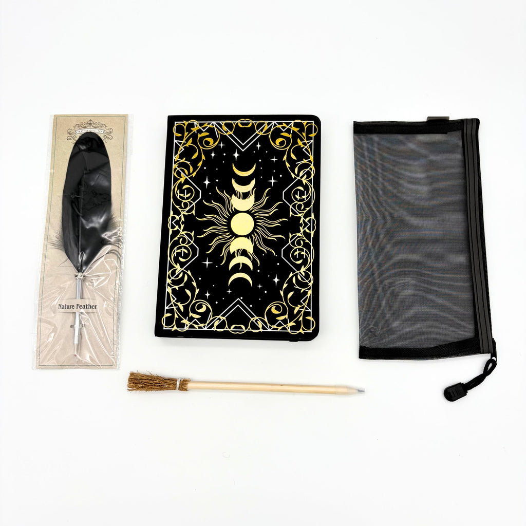 Moon phase A5 journal with gold foil, black feather quill pen, broomstick pen and black mesh pencil bag from the witchy gift box