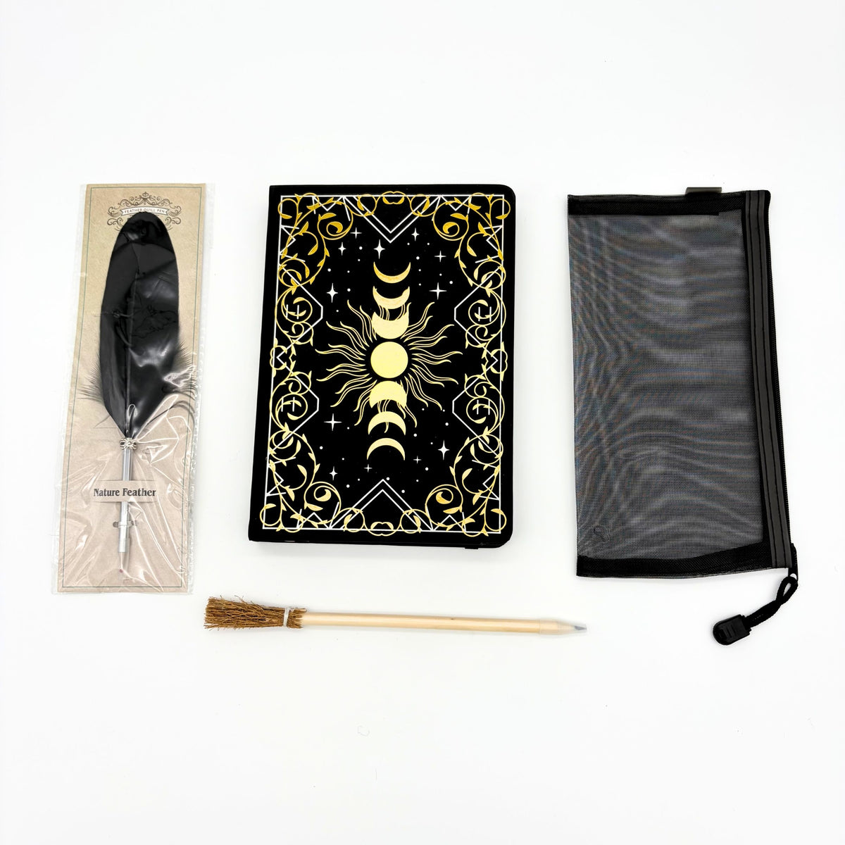 Moon phase A5 journal with gold foil, black feather quill pen, broomstick pen and black mesh pencil bag from the witchy gift box