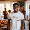 Person wearing a t-shirt with a Costco rotisserie chicken price tag design.