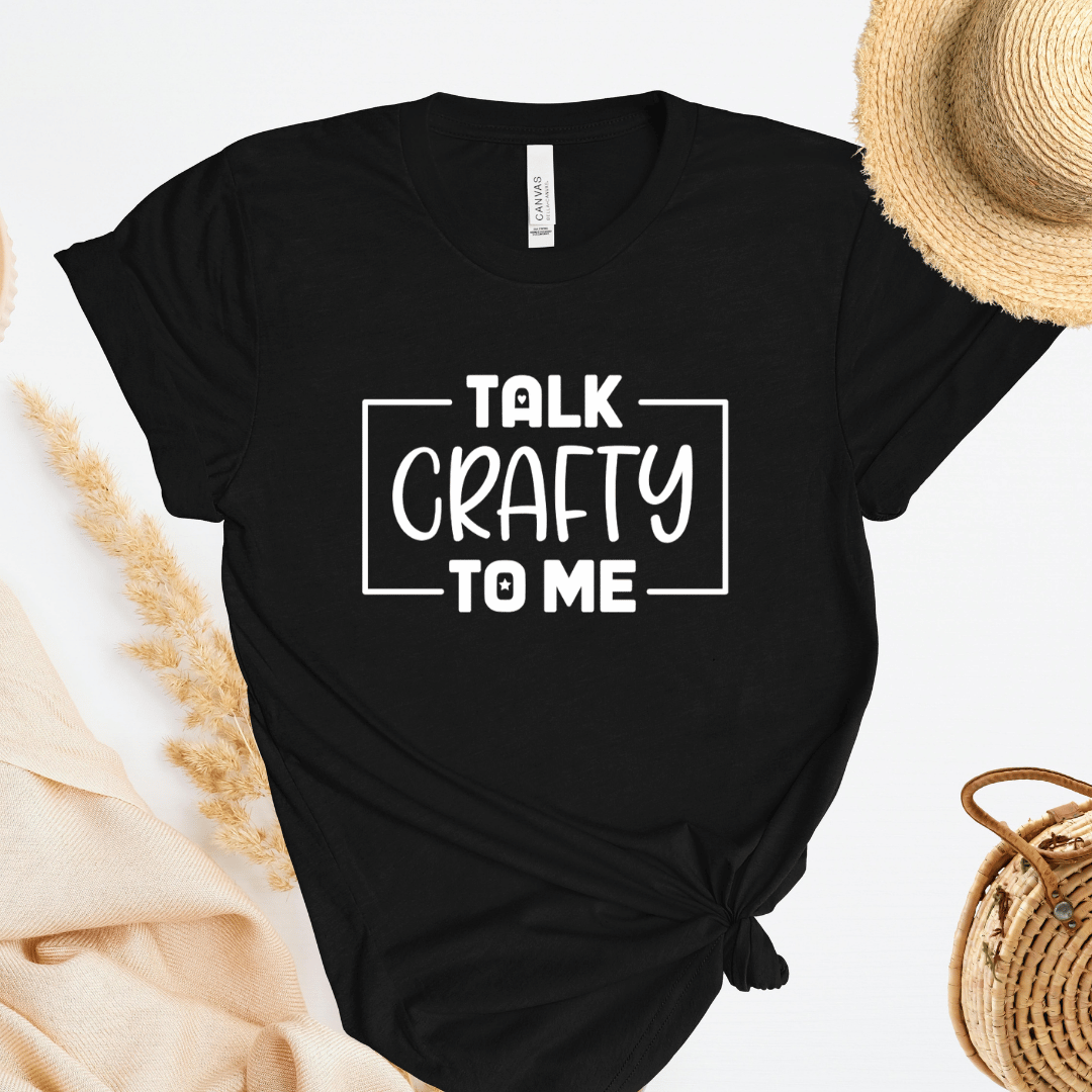 Black t-shirt with 'Talk Crafty to Me' text on a light background