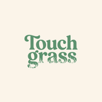 Touch Grass funny meme t-shirt with retro serif font and grass blade lettering graphic